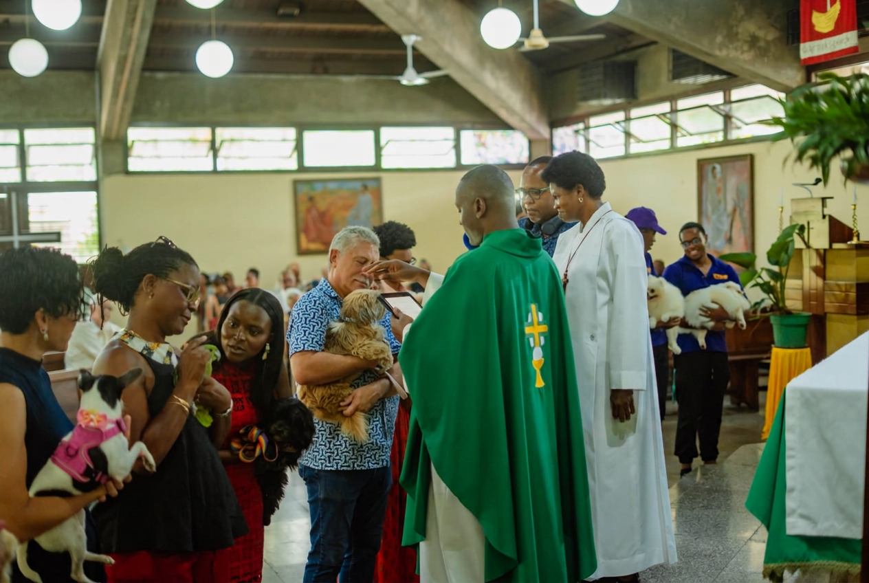 Pets receiving a blessing during the JVMA 80th anniversary church service